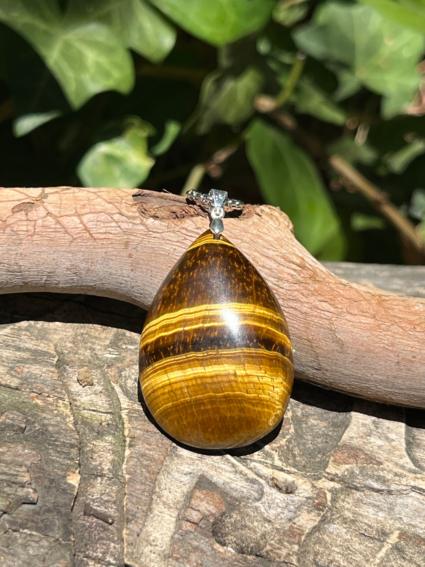 Sterling silver teardrop yellow tiger eye pendant