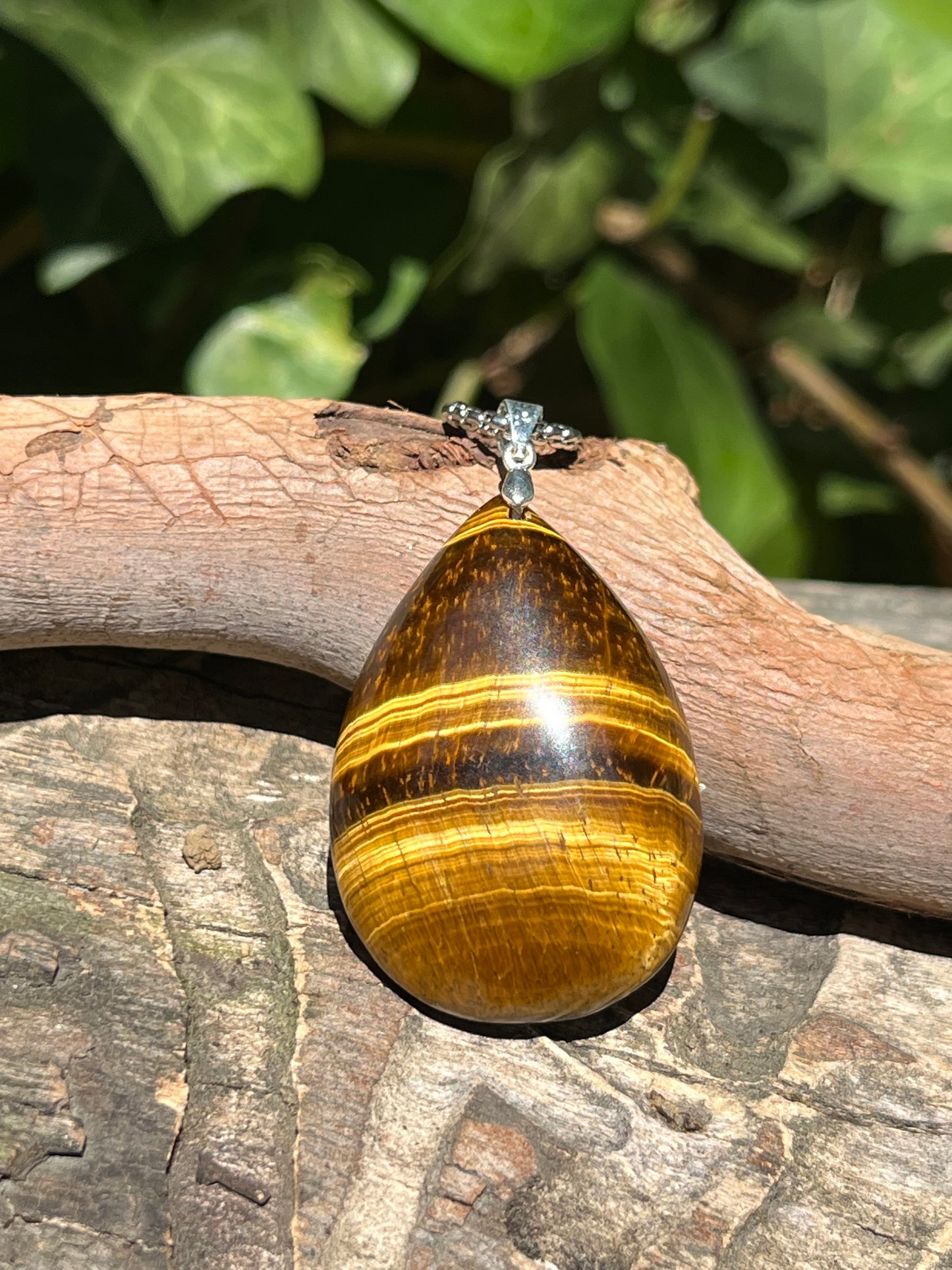 Sterling silver teardrop yellow tiger eye pendant