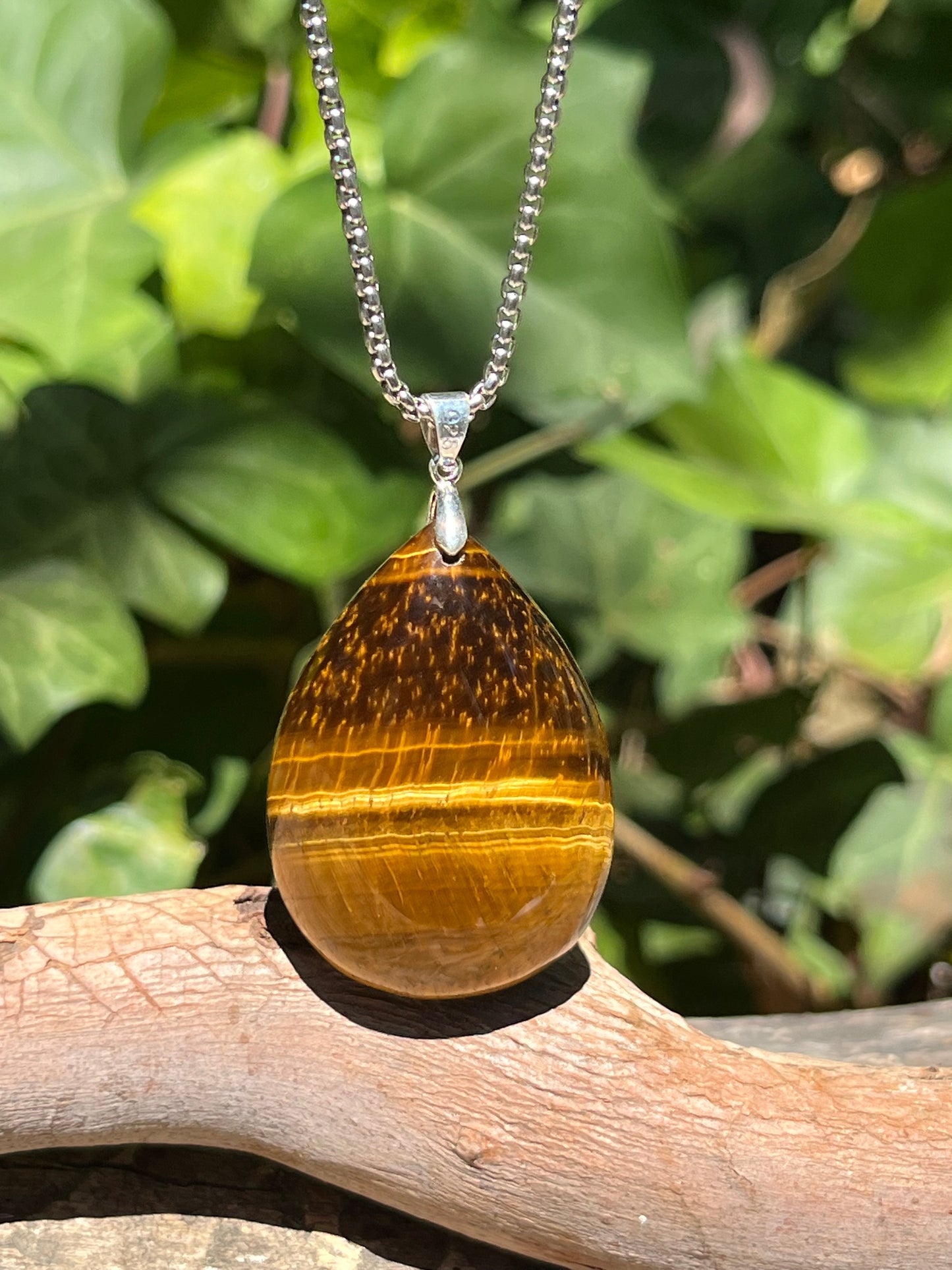 Sterling silver teardrop yellow tiger eye pendant